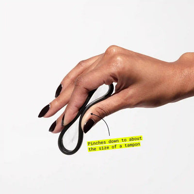 Placeholder: folded disc size comparison to tampon